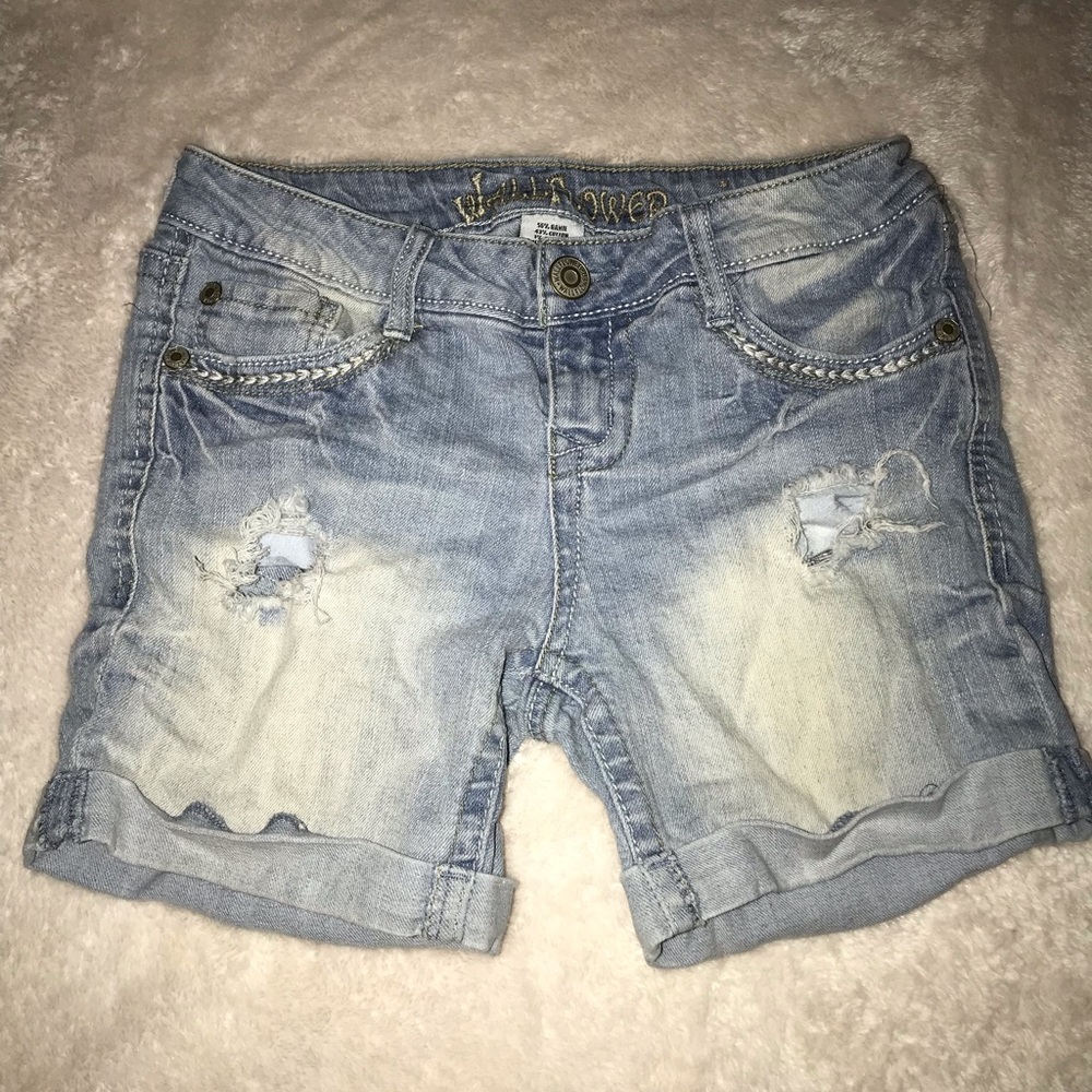 Light denim distressed shorts